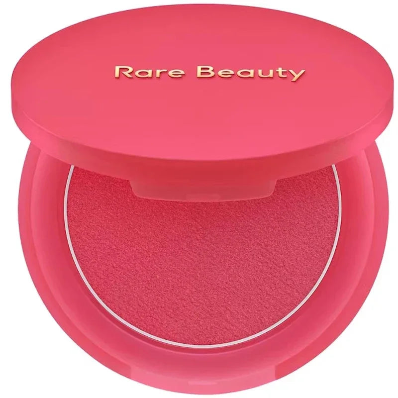 Rubor compacto rosa intenso Rare Beauty, maquillaje de rostro en estuche redondo