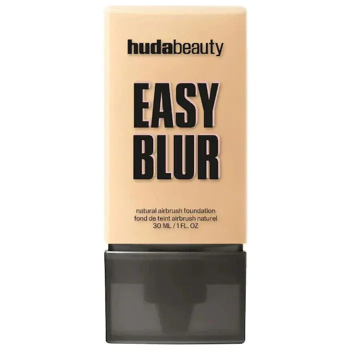 Base de maquillaje Huda Beauty Easy Blur en envase beige de 30 ml, acabado natural.