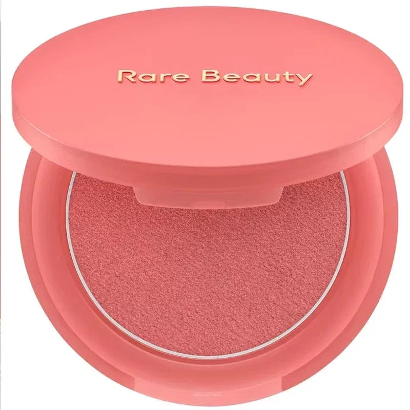 Rubor compacto rosa Rare Beauty maquillaje facial elegante tapa rosa