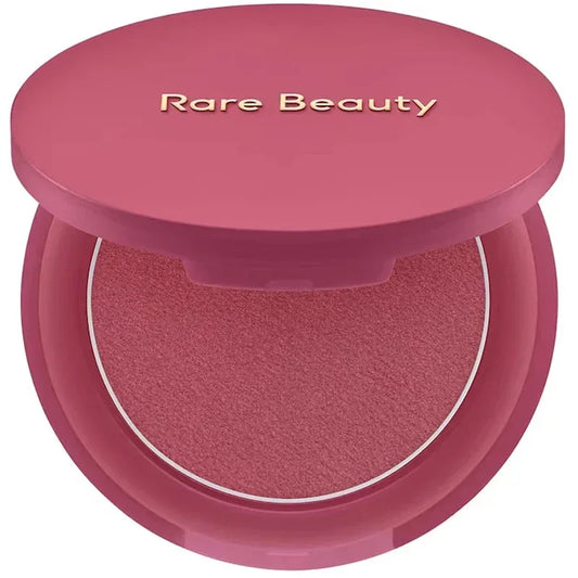 Rubor compacto rosa Rare Beauty en estuche redondo, maquillaje para mejillas